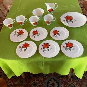 Royal Albert “Tahiti” tea cups, creamer, sugar, serving plates and cake plate